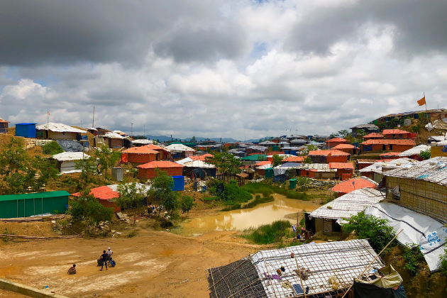 Storm clouds gather over the Rohingya camps. A view of the Military Road, near Ukhiya, Bangladesh