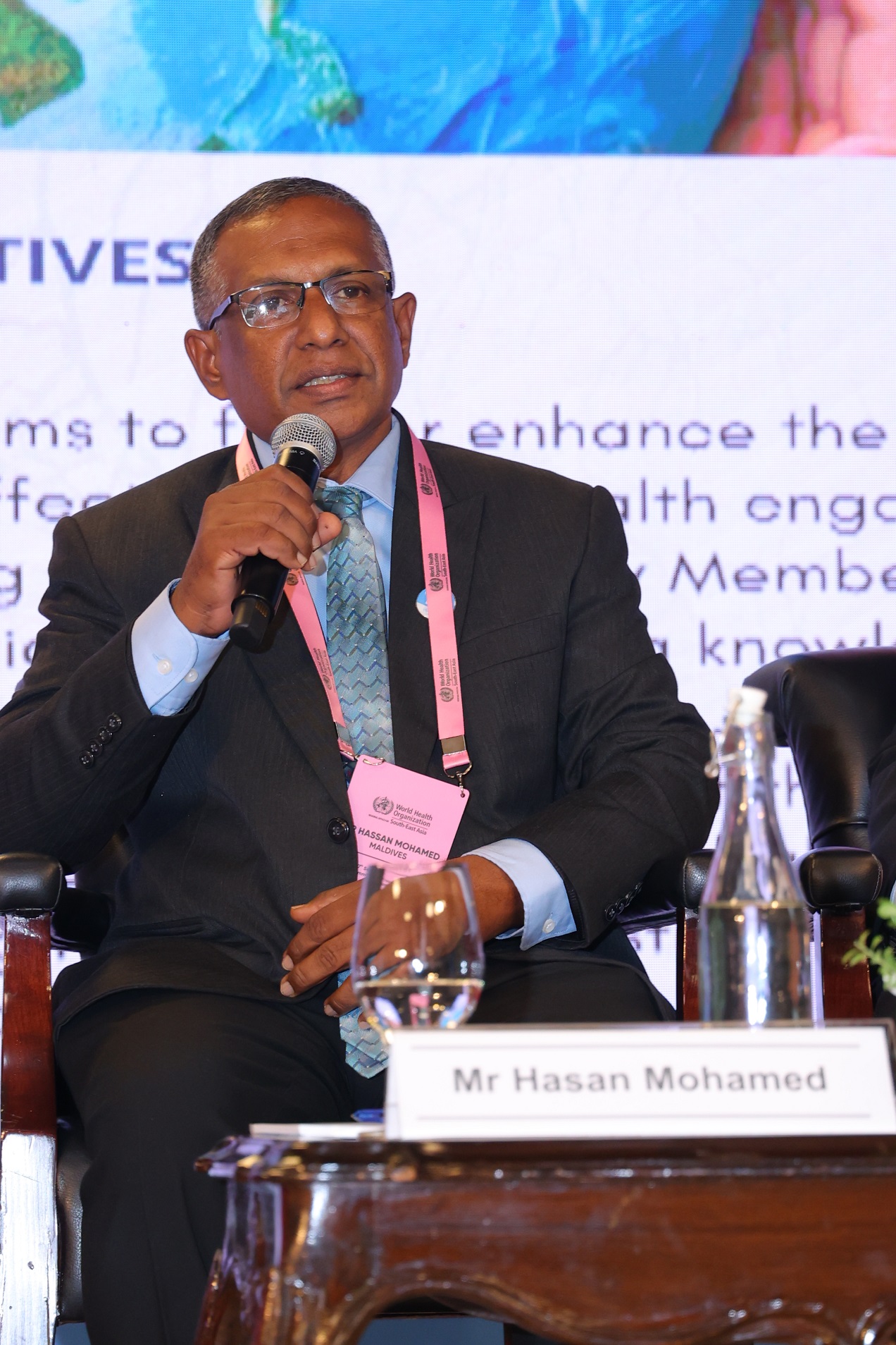 Mr Hasan Mohamed at the brown bag seminar on strengthening national capacity on global health engagement at RC77 New Delhi