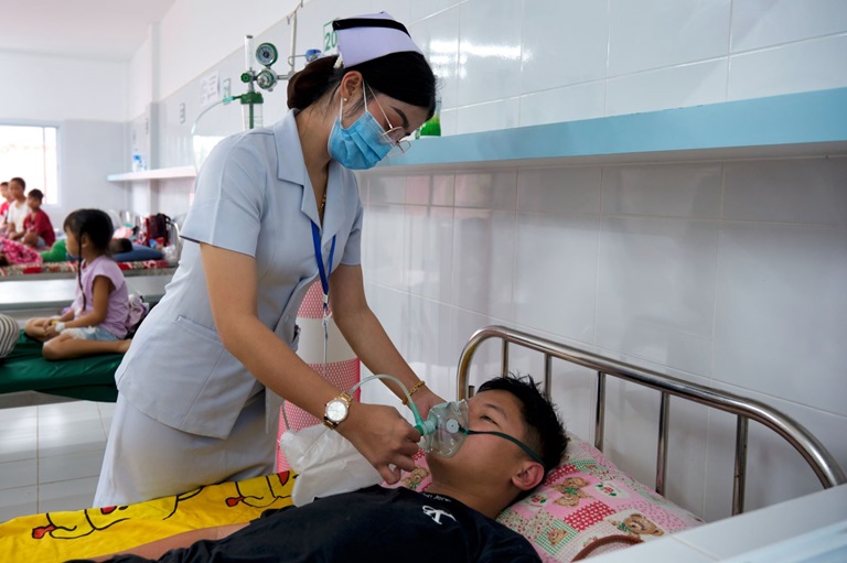 A patient in Savannakhet Provincial Hospital in Lao People's Democratic Republic receives medical oxygen.